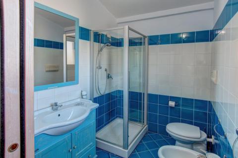 Ferienanlage Ainu auf Sardinien, Tritt Case in Italia