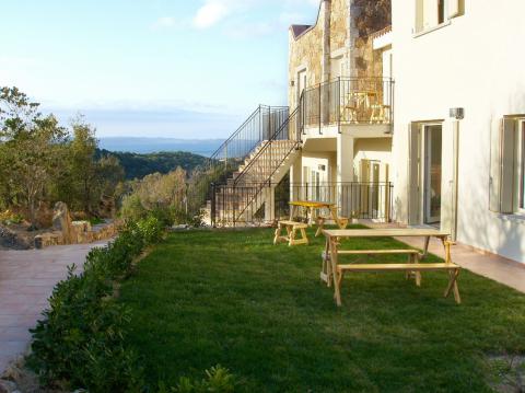 Residence Baja Sardinia, Tritt Case in Italia